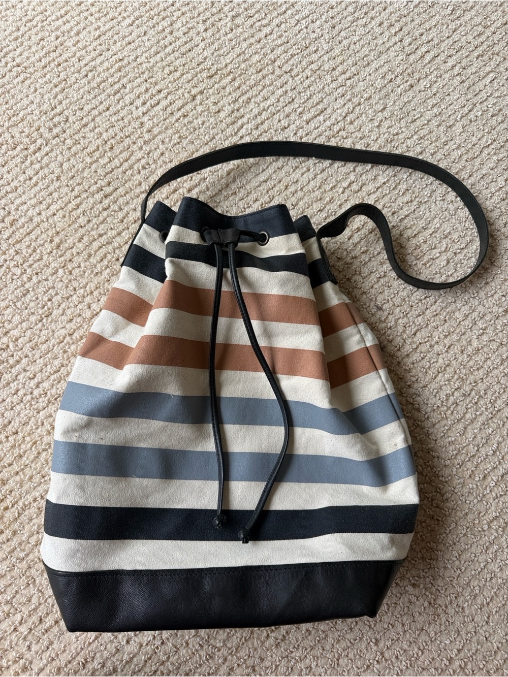 Striped Design Canvas Tote with a drawstring closure and  Interior Zip Pocket